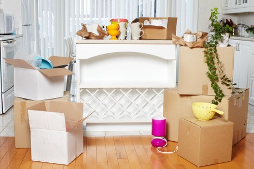 Moving team handling desks and equipment during a Streatham business relocation